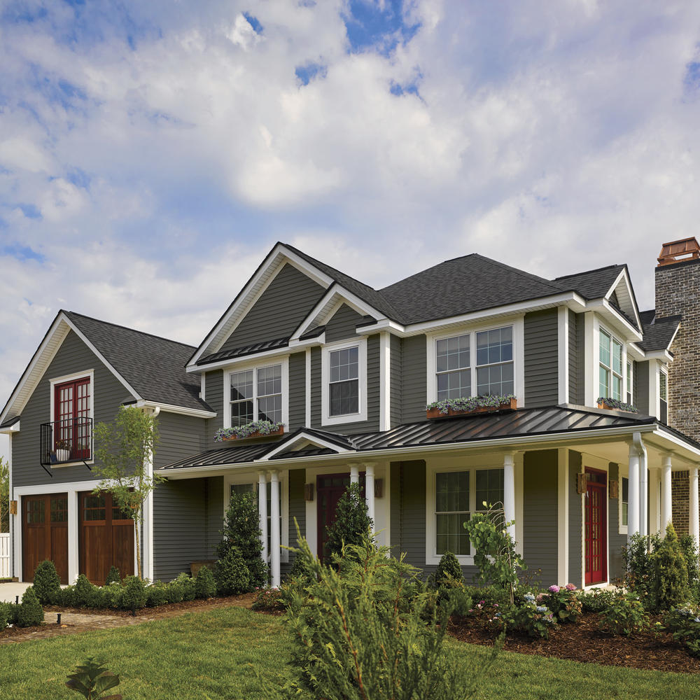Siding installation example by Grace Family Roofing.